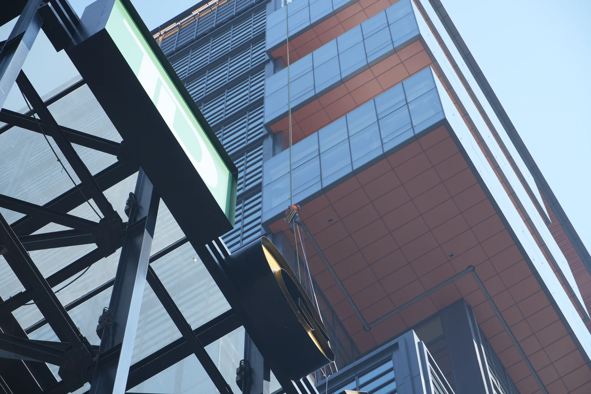 Monorail load testing at a glass-fronted building on Causeway Street in Boston