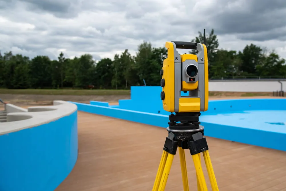 Close view on the theodolite on the construction site