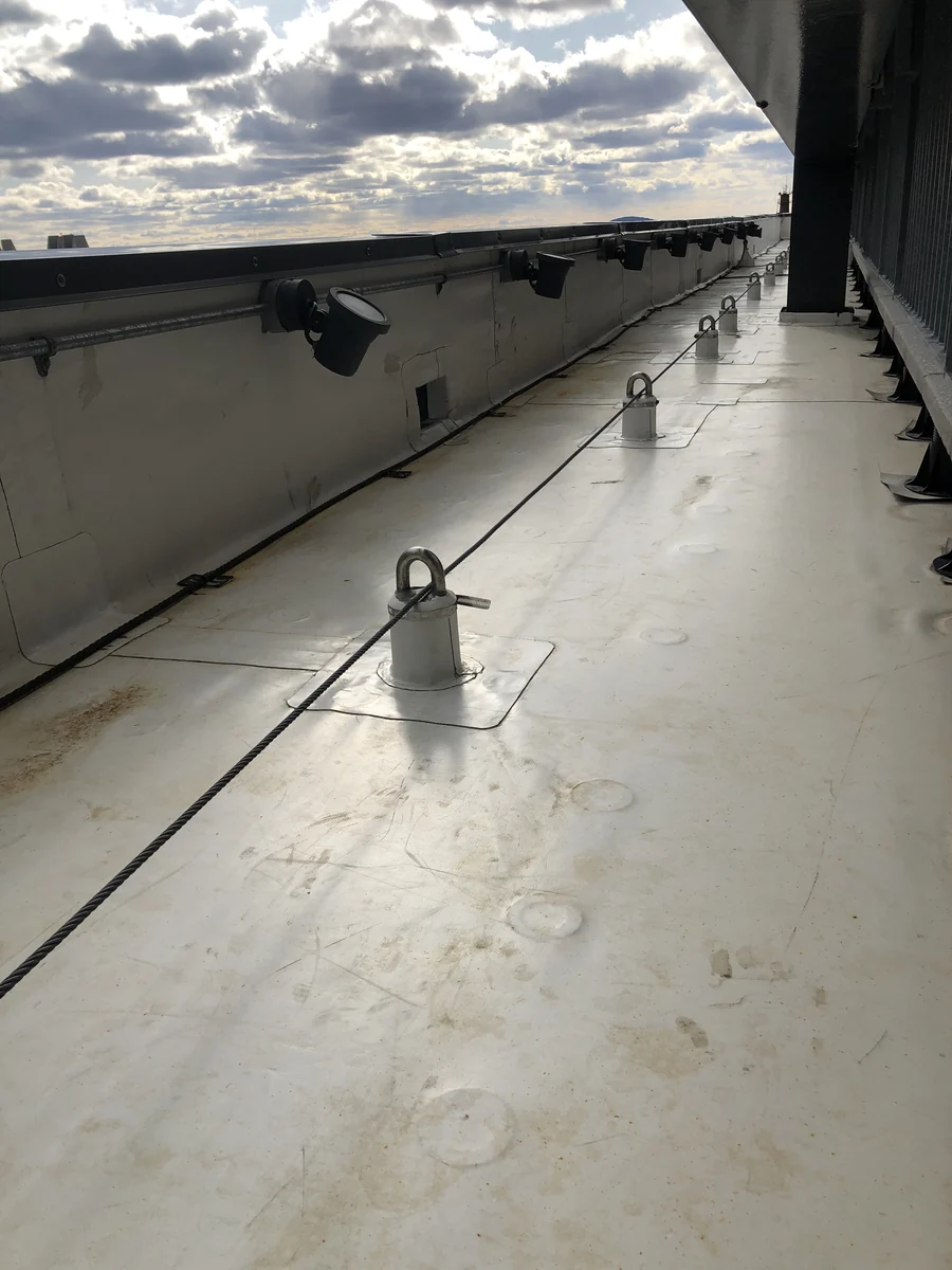 Installed horizontal lifeline along a roof route.