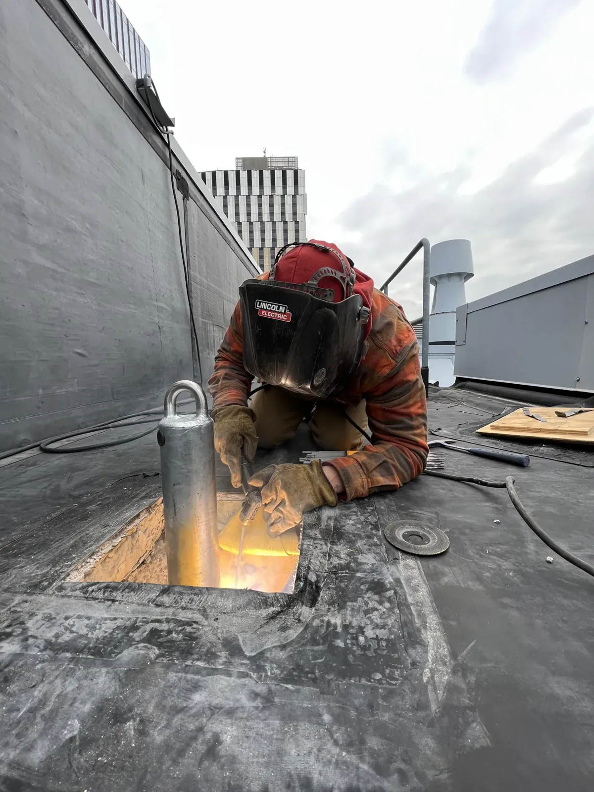 Welding a roof anchor base on site