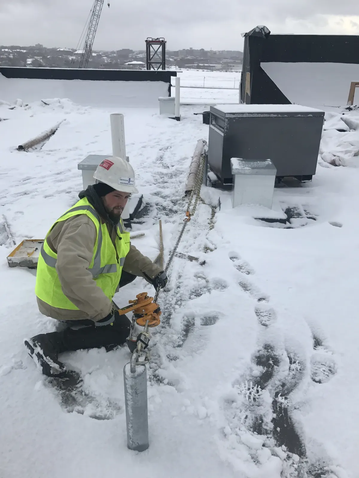 Proof load testing a roof anchor in winter
